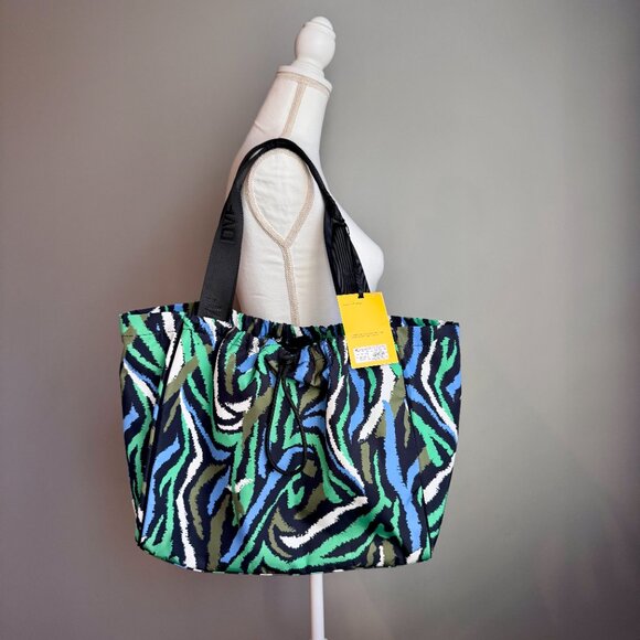 Diane Von Furstenberg Handbags - NWT Diane Von Furstenberg Laptop Bag Disco Zebra Green Fits most 14 inch laptops